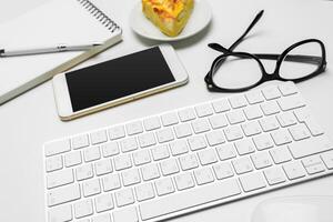 Office desk table with computer keyboard photo