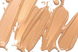 smeared foundation natural make up on white background photo