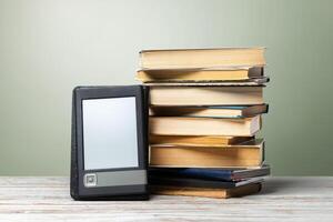 Stacked books on a table photo