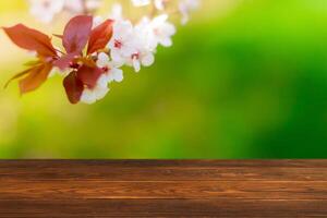 Spring background with wooden table photo