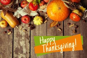 Happy thanksgiving day display on wooden background photo