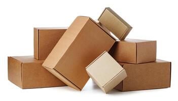 Stacked brown cardboard boxes in various sizes arranged on a white background photo