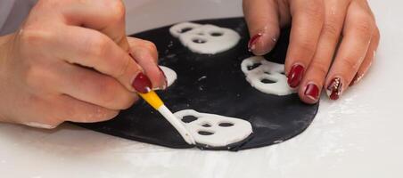 Figures of Halloween with fondant paste or sugar paste. photo