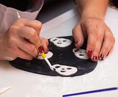 Figures of Halloween with fondant paste or sugar paste. photo