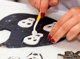 Figures of Halloween with fondant paste or sugar paste. photo