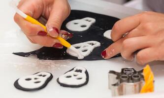 Figures of Halloween with fondant paste or sugar paste. photo
