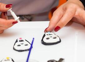 Figures of Halloween with fondant paste or sugar paste. photo
