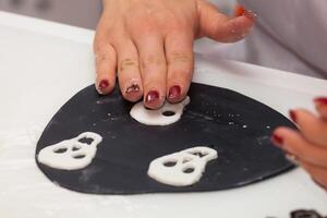 Figures of Halloween with fondant paste or sugar paste. photo