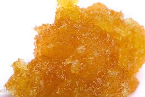 Marijuana resin isolated on white background photo