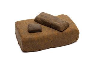 Blocks of hashish isolated on white background photo