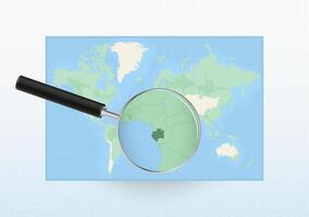 Map of the World with a magnifying glass aimed at Gabon, searching Gabon with loupe. vector
