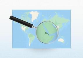 Map of the World with a magnifying glass aimed at Eritrea, searching Eritrea with loupe. vector