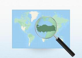 Map of the World with a magnifying glass aimed at Turkey, searching Turkey with loupe. vector