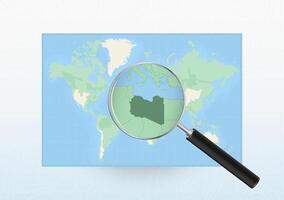 Map of the World with a magnifying glass aimed at Libya, searching Libya with loupe. vector