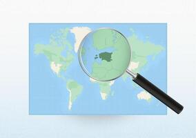 Map of the World with a magnifying glass aimed at Estonia, searching Estonia with loupe. vector