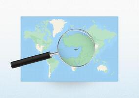 Map of the World with a magnifying glass aimed at Cyprus, searching Cyprus with loupe. vector