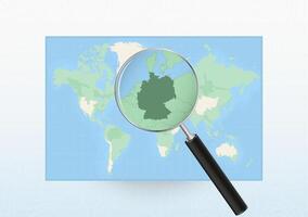 Map of the World with a magnifying glass aimed at Germany, searching Germany with loupe. vector