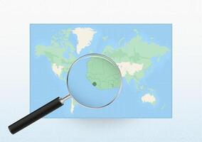 Map of the World with a magnifying glass aimed at Sierra Leone, searching Sierra Leone with loupe. vector
