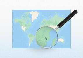 Map of the World with a magnifying glass aimed at Malawi, searching Malawi with loupe. vector