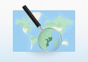 Map of the World with a magnifying glass aimed at Mozambique, searching Mozambique with loupe. vector