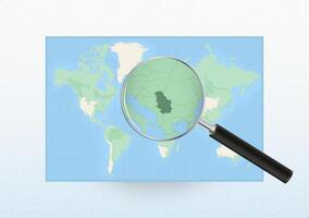Map of the World with a magnifying glass aimed at Serbia, searching Serbia with loupe. vector