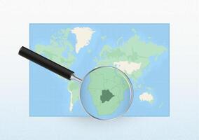 Map of the World with a magnifying glass aimed at Botswana, searching Botswana with loupe. vector