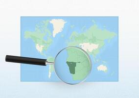 Map of the World with a magnifying glass aimed at Namibia, searching Namibia with loupe. vector