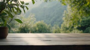 A serene wooden table in a lush green landscape during golden hour photo