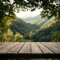 Serene wooden table overlooking lush green valley at sunset photo