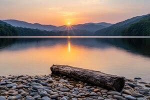 Serene sunset over a tranquil lake with mountains in the background photo