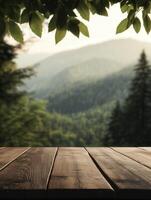 Serene wooden table overlooking a misty mountain landscape at dawn photo