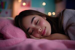 Young girl sleeping peacefully on a cozy bed surrounded by soft blankets photo