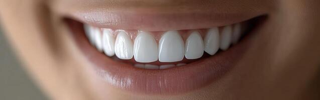 Bright smile with perfectly aligned teeth captured in natural light photo
