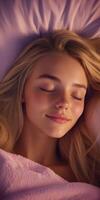 Young woman peacefully asleep in a cozy setting at nighttime photo