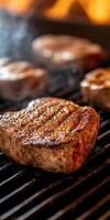 Juicy beef steaks sizzling on a grill in a backyard barbecue setting photo