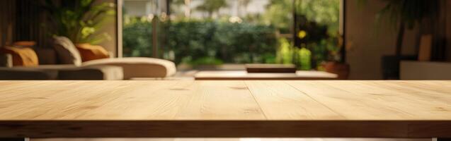 Bright living room with wooden table and lush garden view in daylight photo