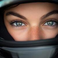 Female race car driver focused before the race at a motorsport event photo