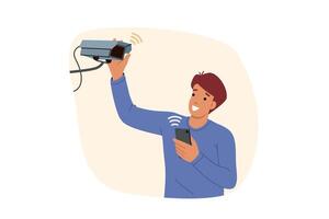 Man installs security camera on wall and uses mobile phone with wifi to monitor cctv equipment vector