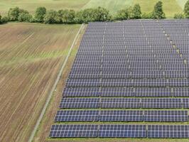 Aerial view of a solar farm, renewable energy and photovoltaic technology photo