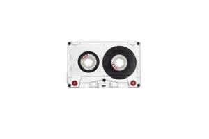 Close-up of an audio cassette with a sticker without text. Analog storage medium. Cassettes for audio recordings and music. photo