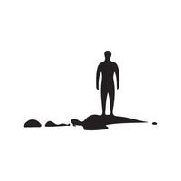 A silhouette of a man standing on a rock vector