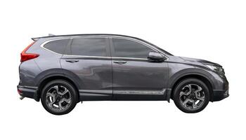Side view of elegant dark gray SUV sports car isolated on white background with clipping path photo
