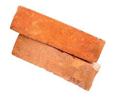 Top view of old red or orange bricks in stack isolated on white background with clipping path photo