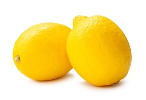 Side view of two fresh ripe yellow lemon fruit in stack isolated on white background with clipping path photo