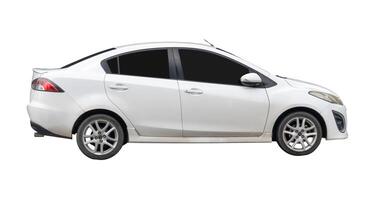 Side view of white sedan car isolated on white background with clipping path photo