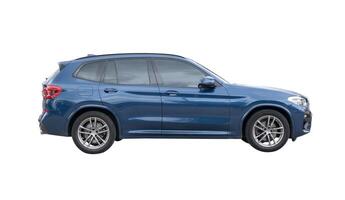 Side view of blue hatchback car isolated on white background with clipping path photo