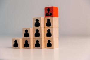 Successful manager demonstrates strong leadership by guiding group in right direction, inspiring them to follow innovative ideas and stay ahead of competition. influence, supervision, attitude. photo