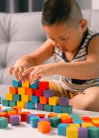 Children enjoy colourful game with educational toy blocks that make play fun activity, enhancing their development during childhood. gathering, creation, exercise, inspiration, improvement, practice. photo