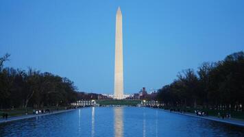 The monument tower view with the sunset sky as background in Washington DC photo