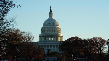 The Washington DC city view with the Capitol Hill building as background in autumn photo